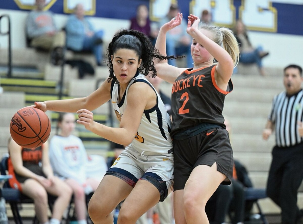 Copley's Izzy Callaway drives around a defender against Buckeye on February 21, 2024.